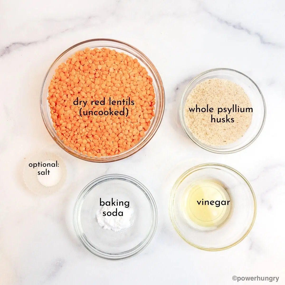 ingredients for lentil bread rolls in glass bowls