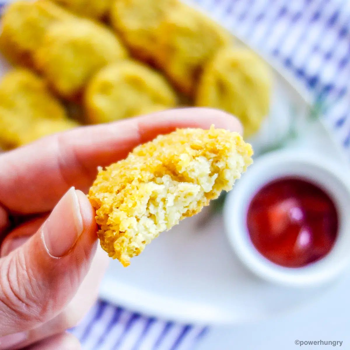 millet nugget with a bite taken out revealing interior