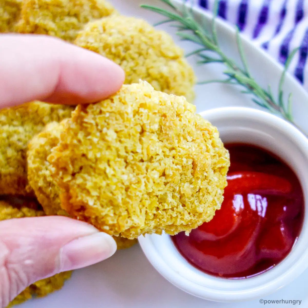 milletnugget about to be dipped in ketchup