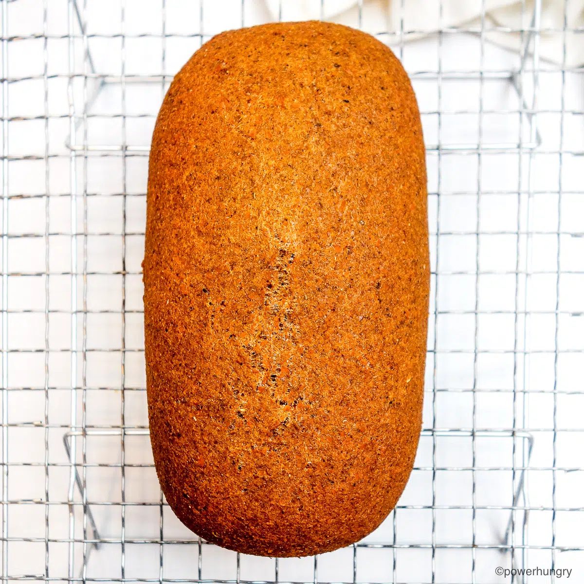 lentil pumpkin bread on a cooling rack