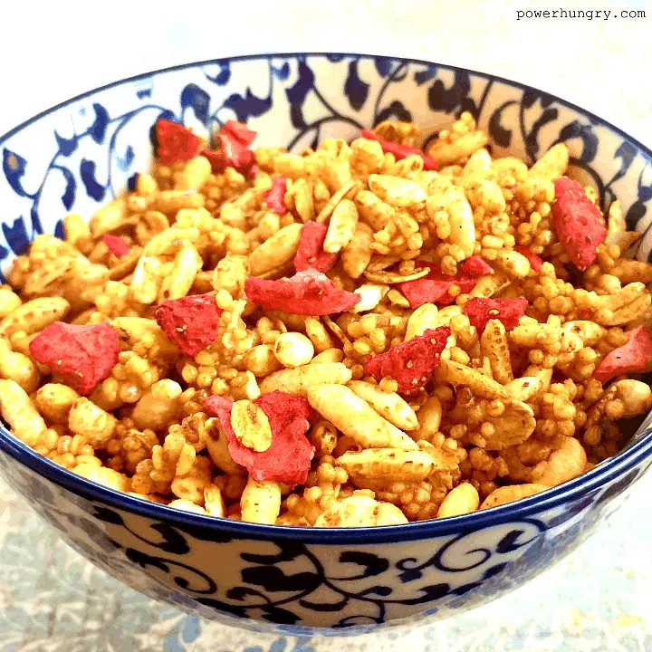 close-up of blue and white bowl filled with low calorie granola