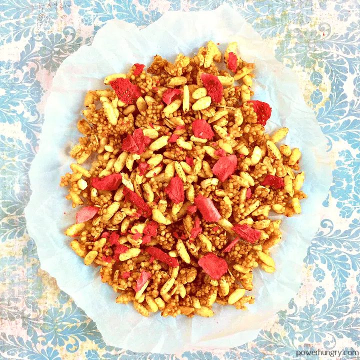 low cal granola made with puffed millet on a piece of white parchment paper