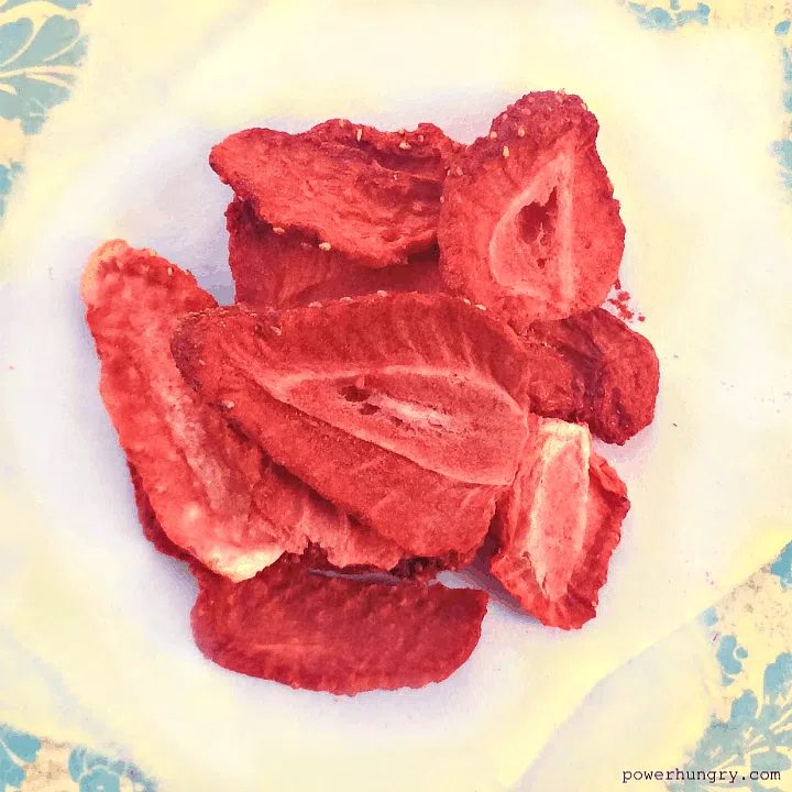 overhead shot of a handful of freeze-dried strawberries