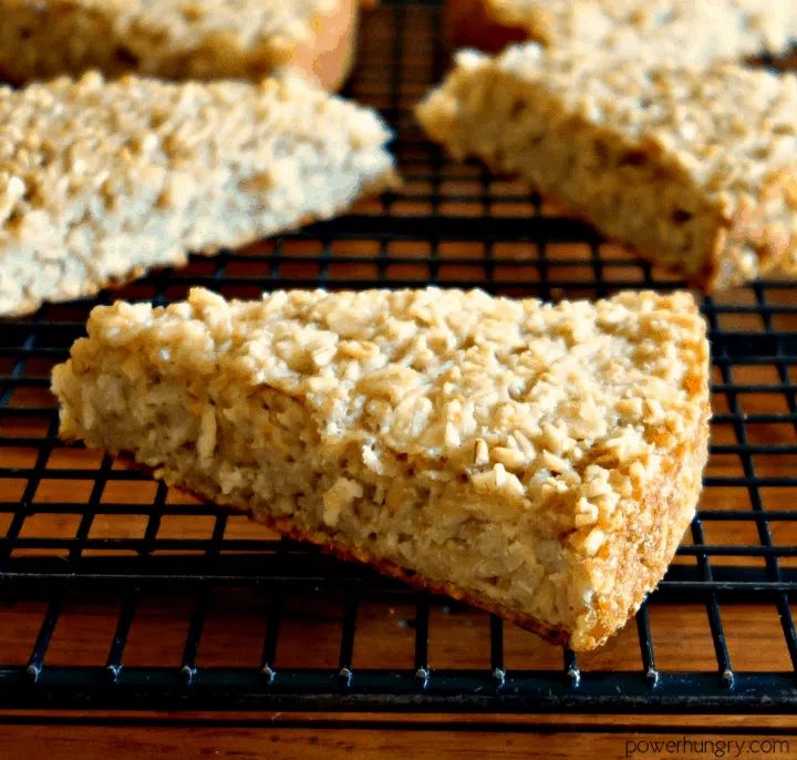 close up of a piece of Irish oat scone bread on a black cooling rack