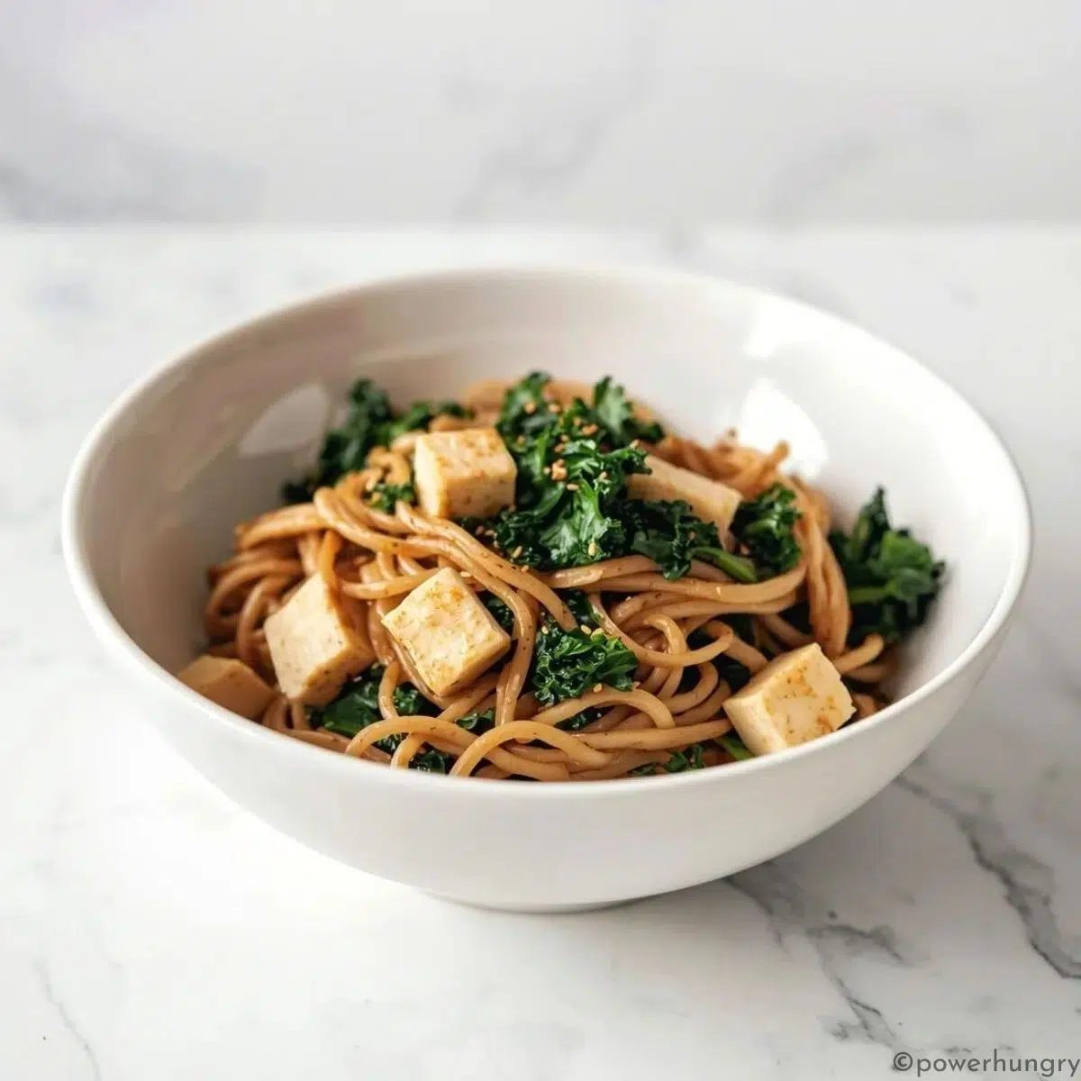 side view of vegan high protein noodles with kale and tofu