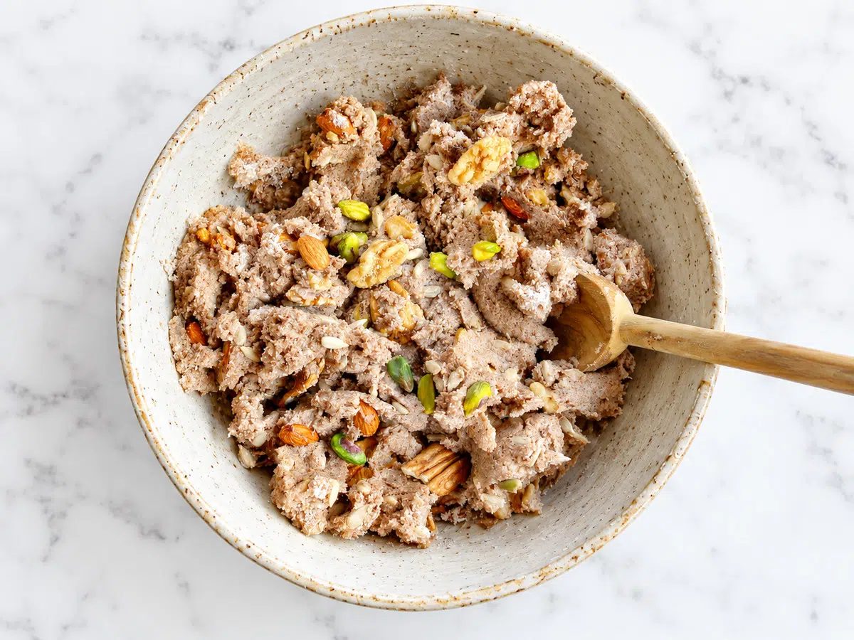 vegan coconut flour bread dough in a stoneware mixing bowl