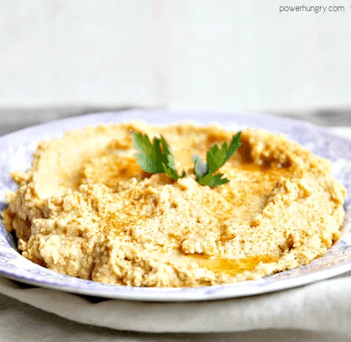 lemony roasted parsnip hummus in a chia bowl atop a grey napkin