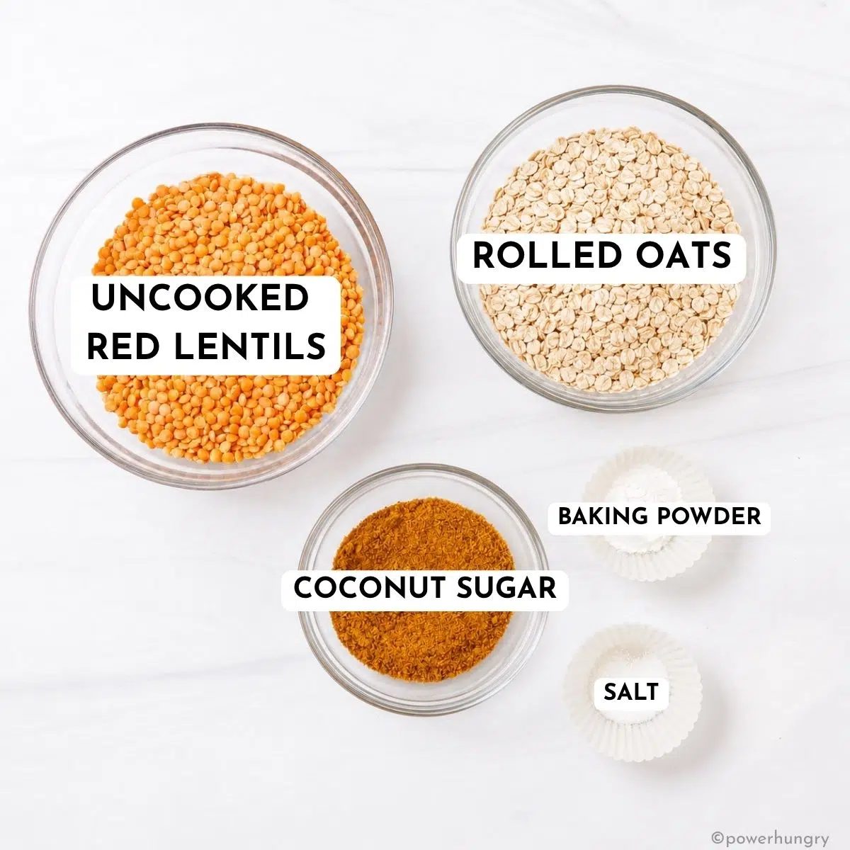 ingredients for red lentil pancakes, in clear glass bowls