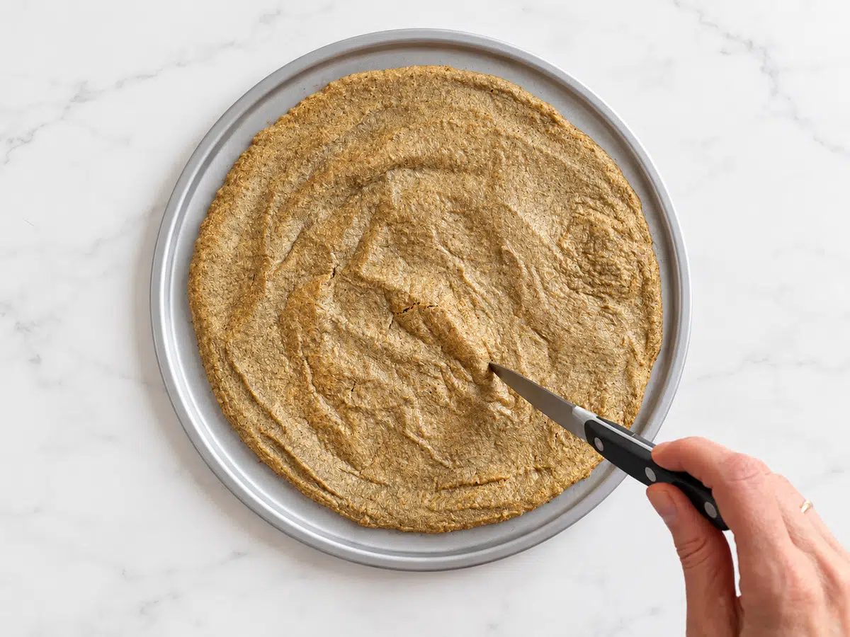 deflating 2-ingredient pizza crust after first bake