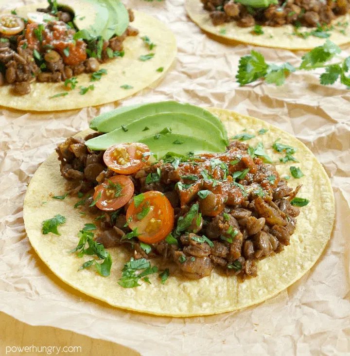vegan lentil tacos with avocado and tomatoes