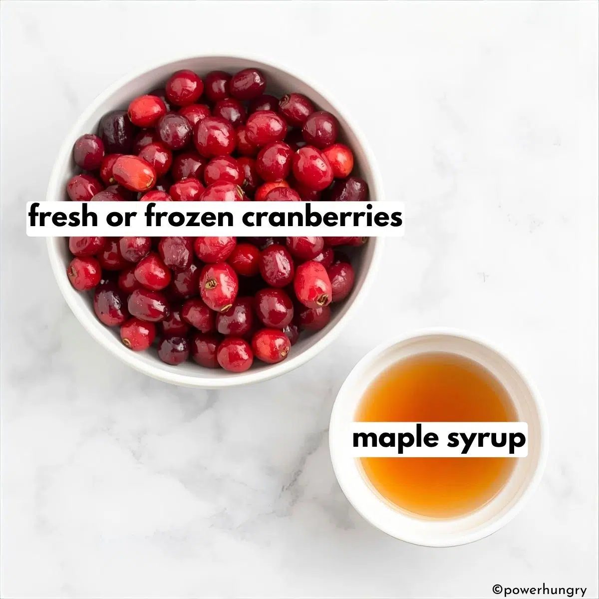 ingredients for maple cranberry sauce in white bowls