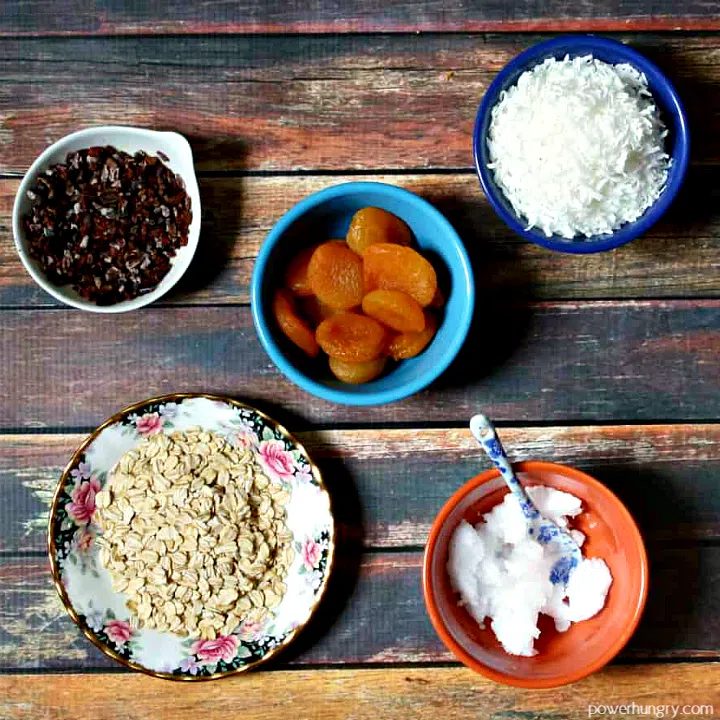 overhed shot of the 5 ingredients needed for millet and apricot energy bars