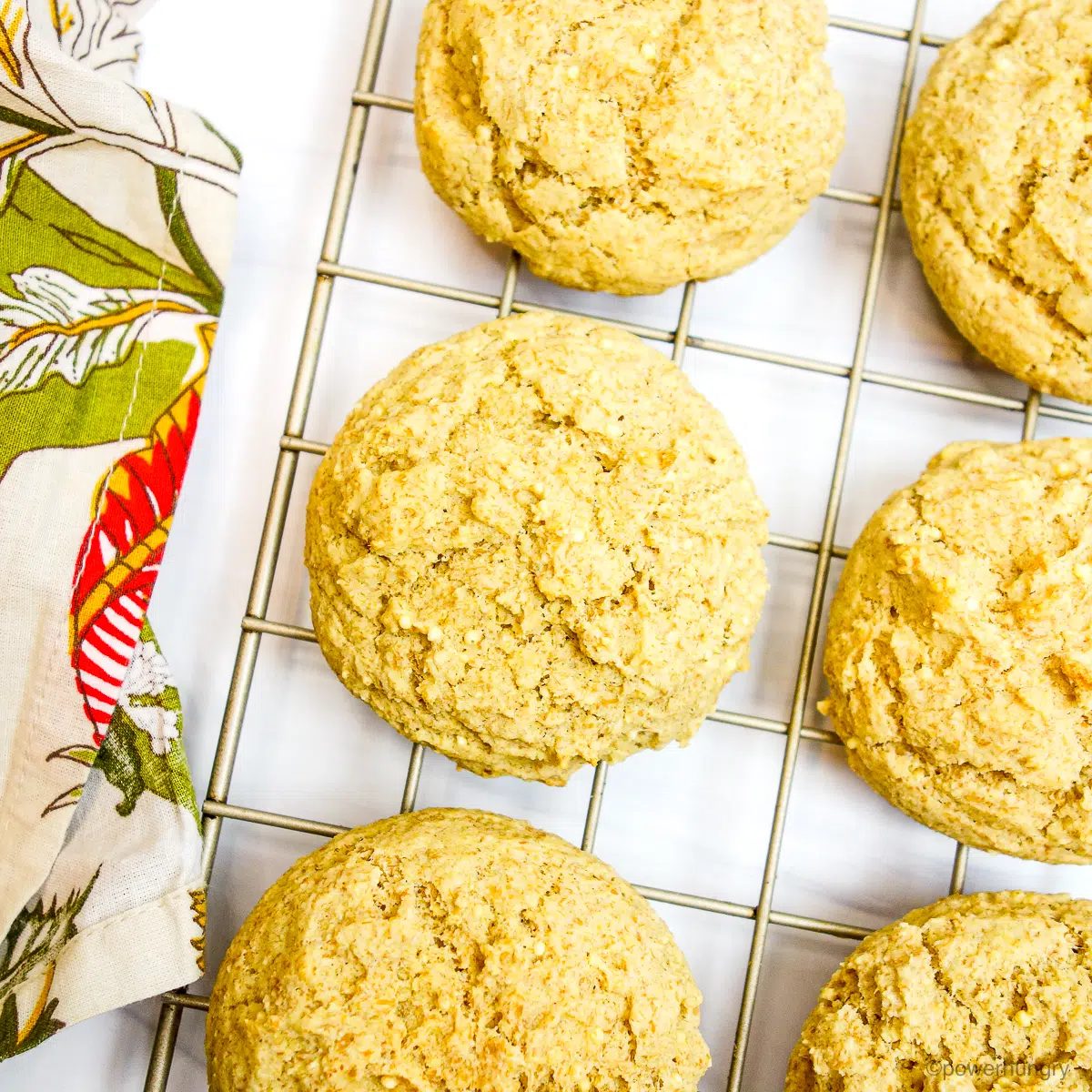 millet biscuits on a gold cooling rack