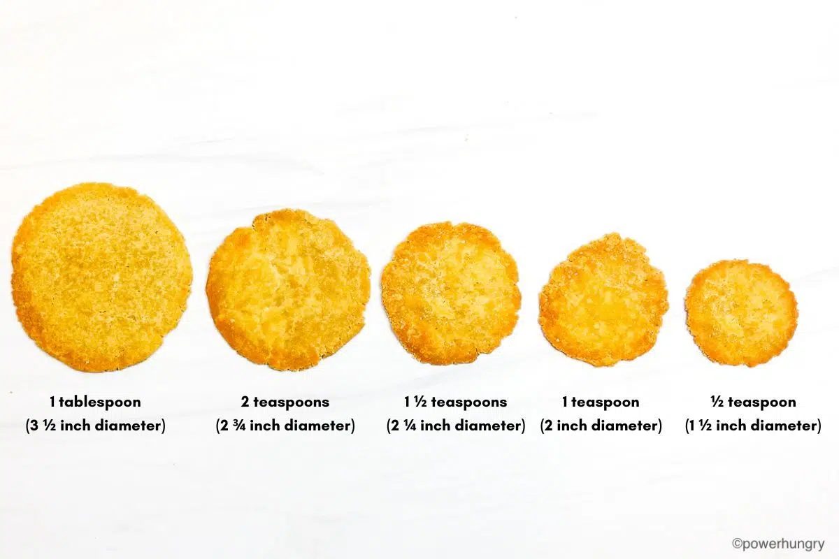 different sizes of millet crackers on marble background