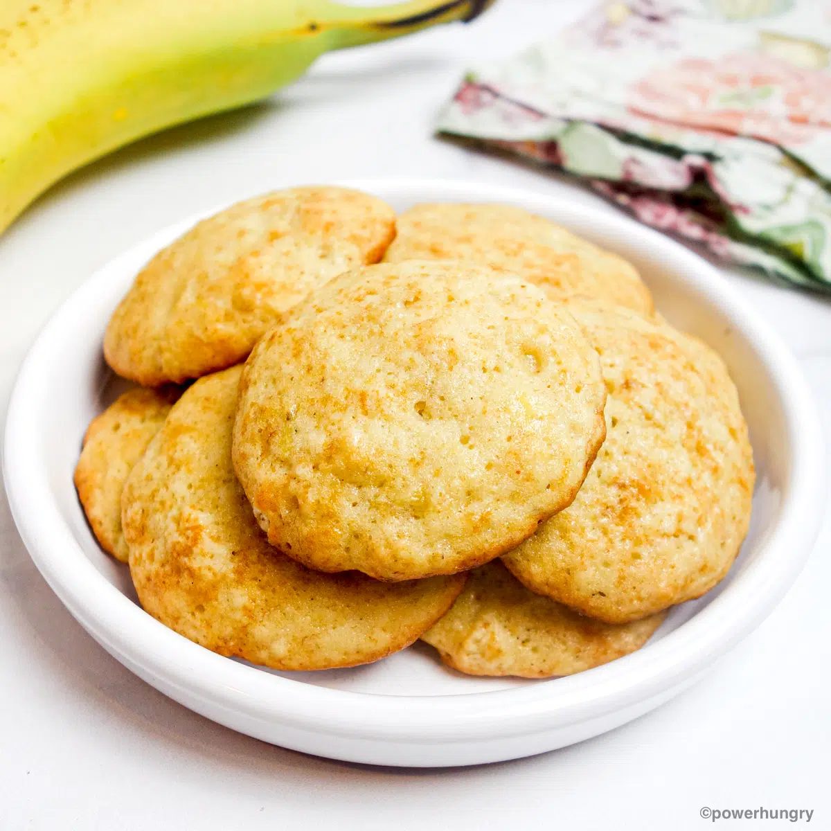 a white pilled filled with millet flour banana cookies