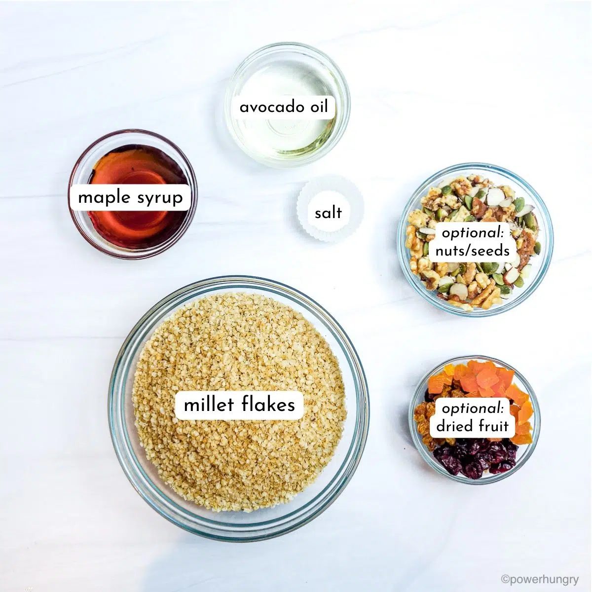 millet granola ingredients in glass bowls