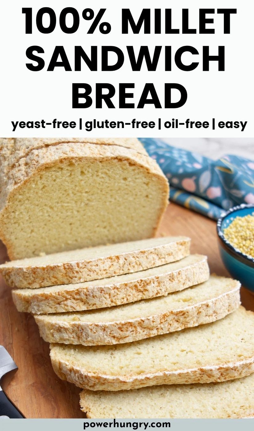 a loaf of yeast-free 100% millet bread , sliced, on a cutting board