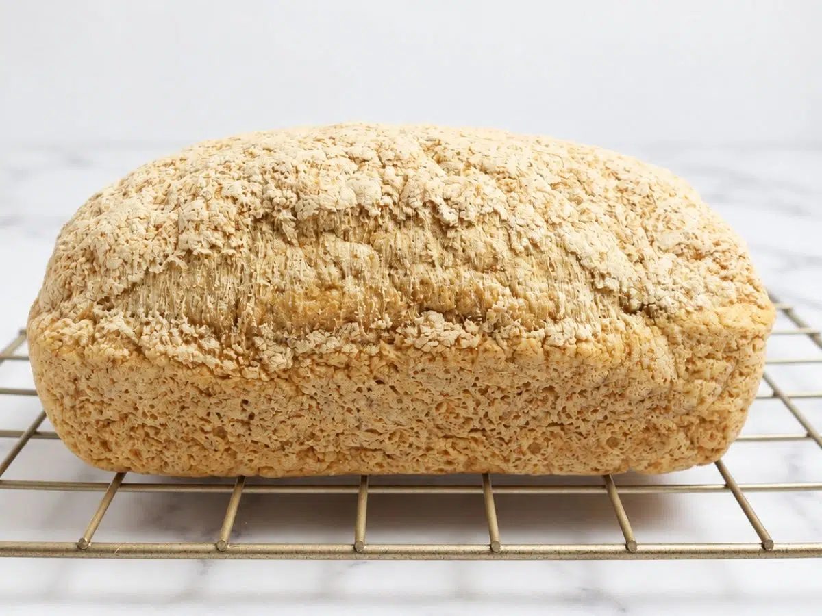 100% millet sandwich bread cooling on a cooling rack