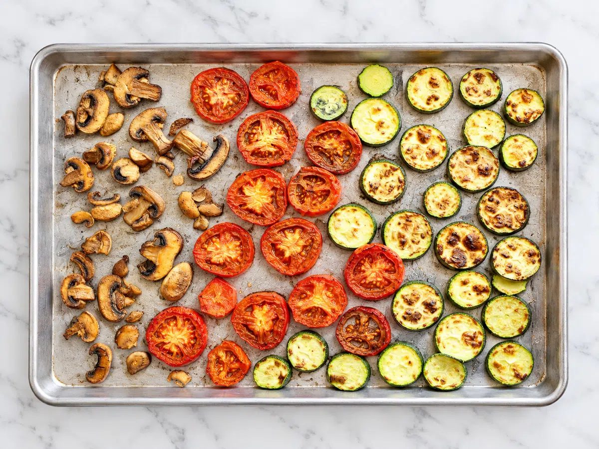 broiled vegetables on sheet pan for chickpea crust pizzas