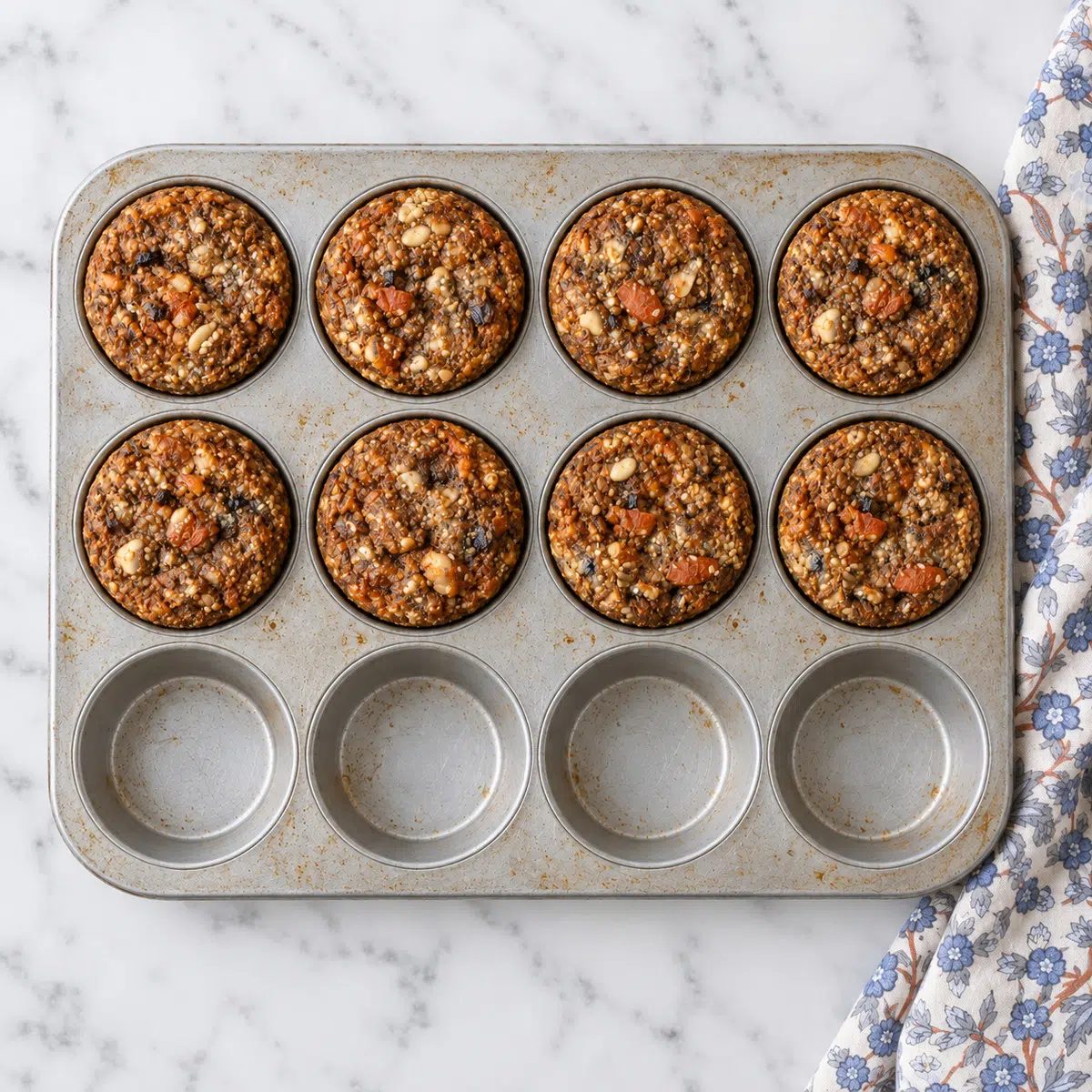 muffin tin filled with 8 mushroom flaxseed bread