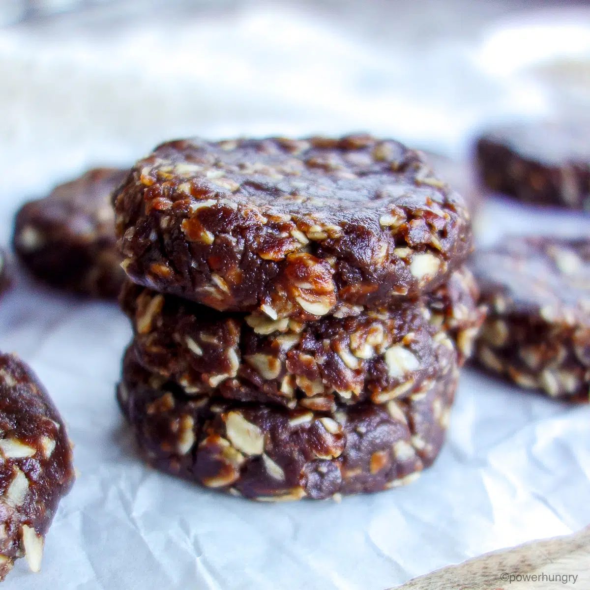 stack of three chocolate oat no bake cookies