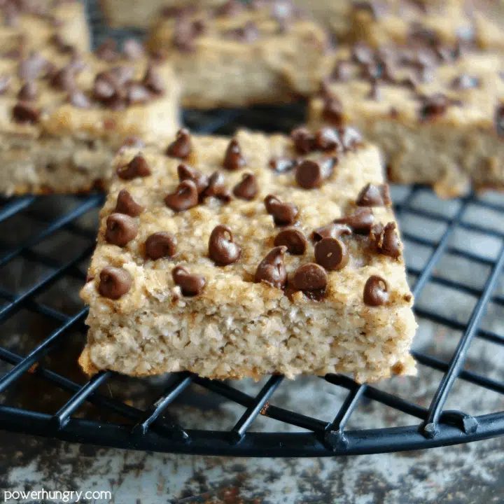 Squares of Oat Almond Flour Banana Bars on a Cooling Rack