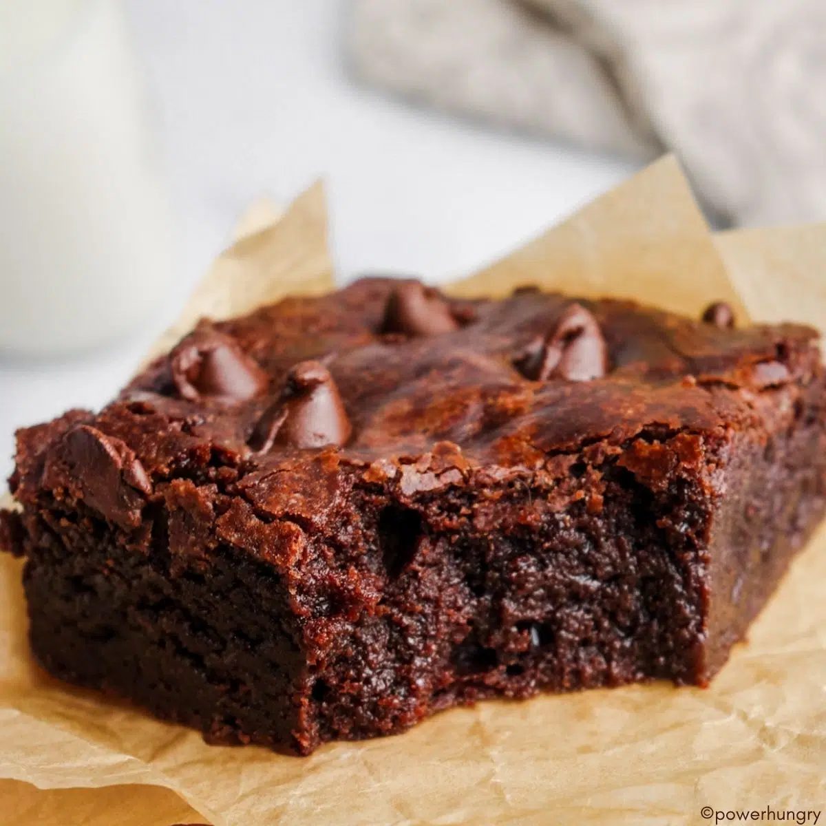 vegan oat flour brownie with a bite taken out