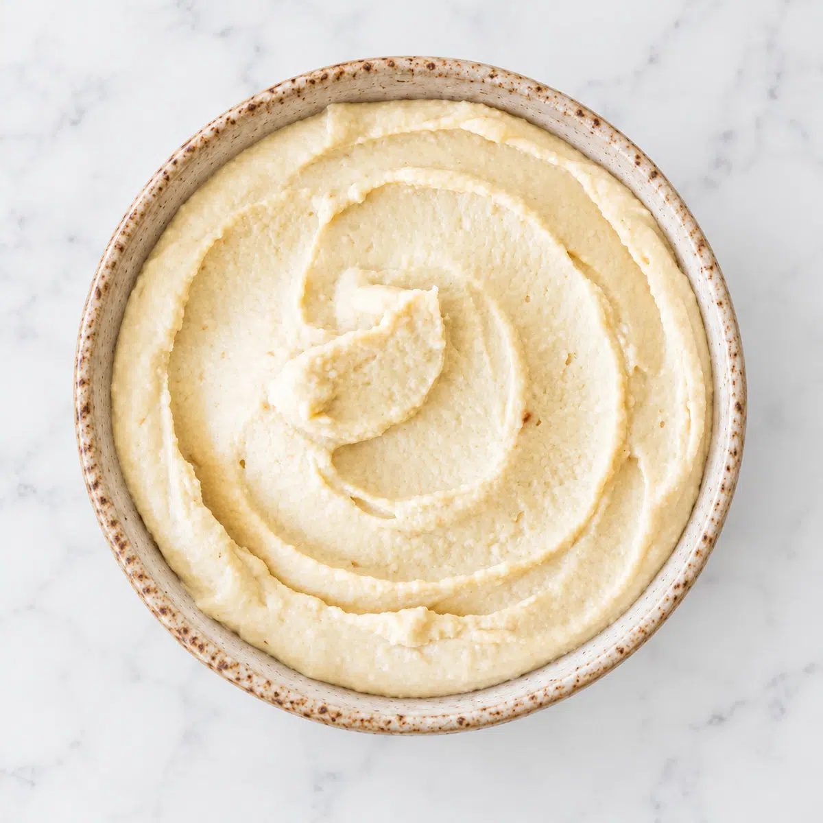 oil-free hummus without tahini without toppings in bowl