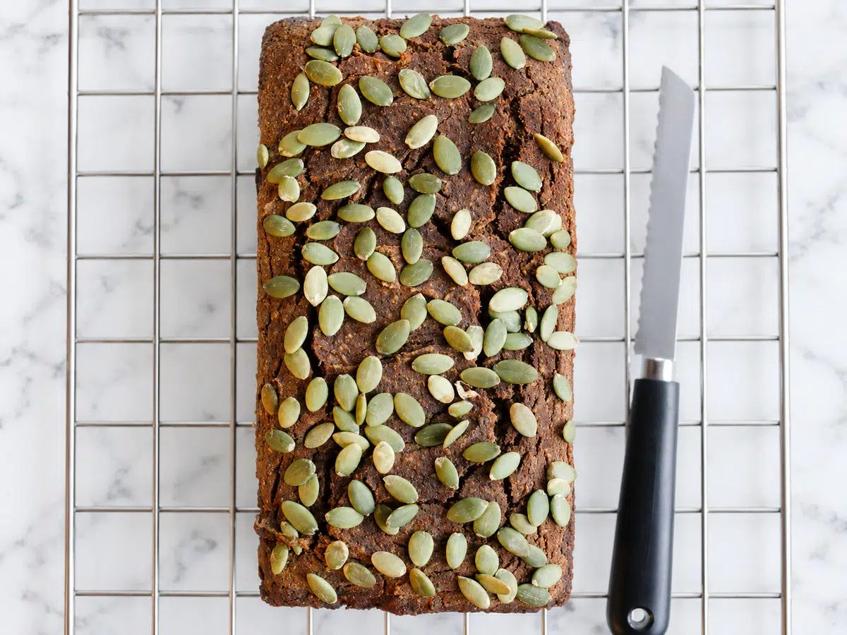 buckwheat pumpkin bread out of pan on cooling rack