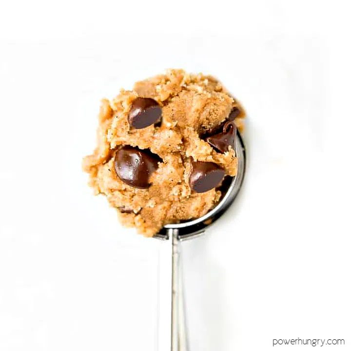 small cookie scoop filled with vegan chocolate chip cookie dough