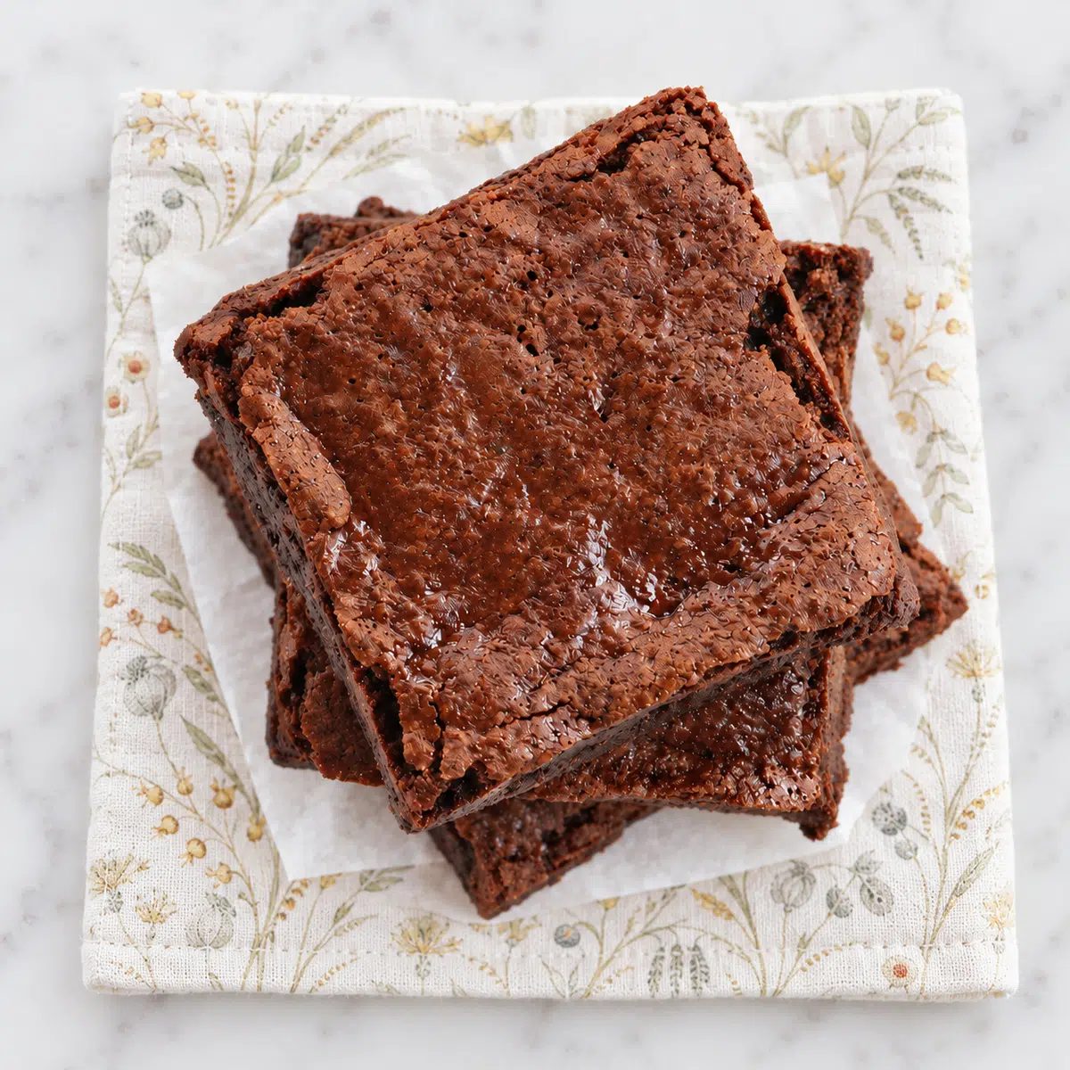 overhead shot of a stack of chickpea flour brownies