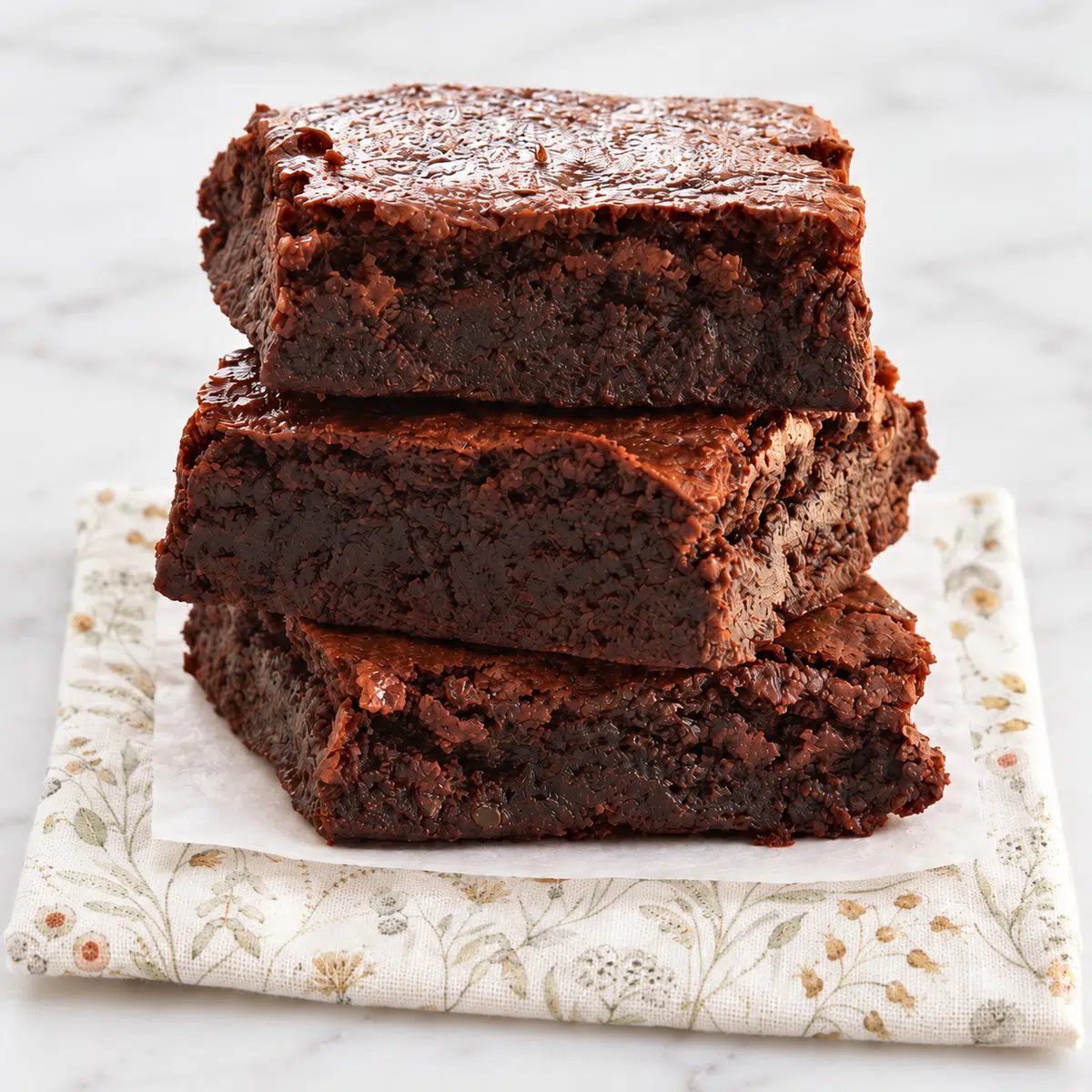 stack of three chickpea flour brownies