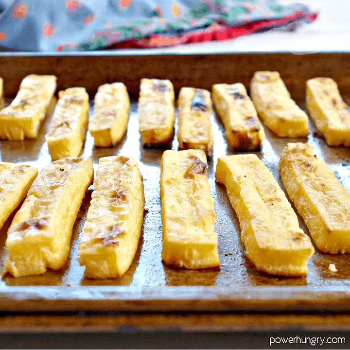 close-up of chickpea flour French fries on a baking sheet