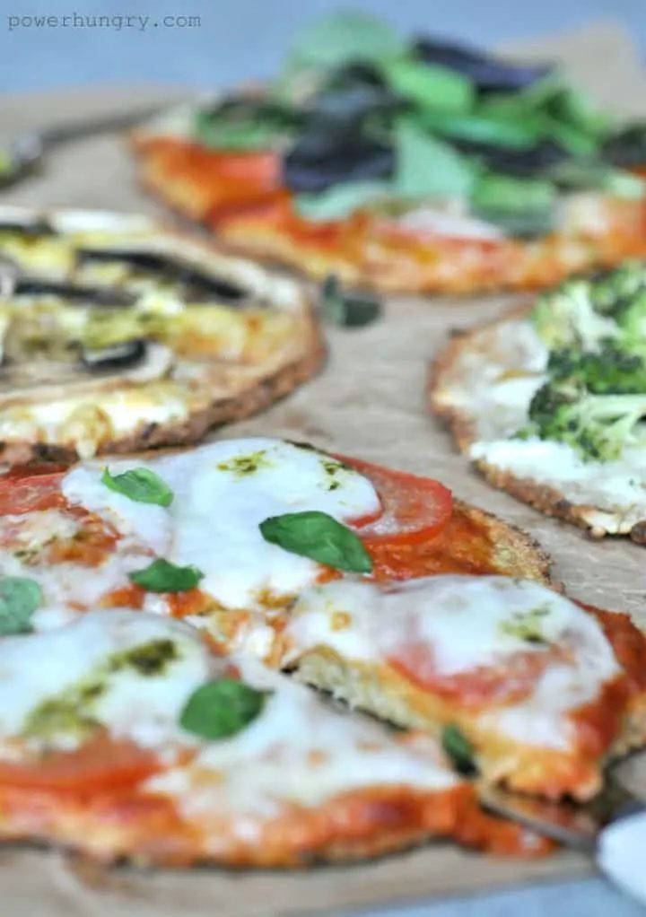 close up of vegan pizza crusts with toppings