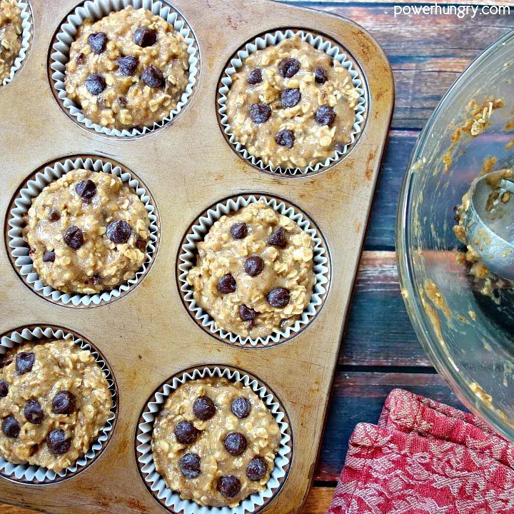 Unbaked Peanut Butter Banana Baked Oatmeal with red napkin and glass mixing bowl alongside.
