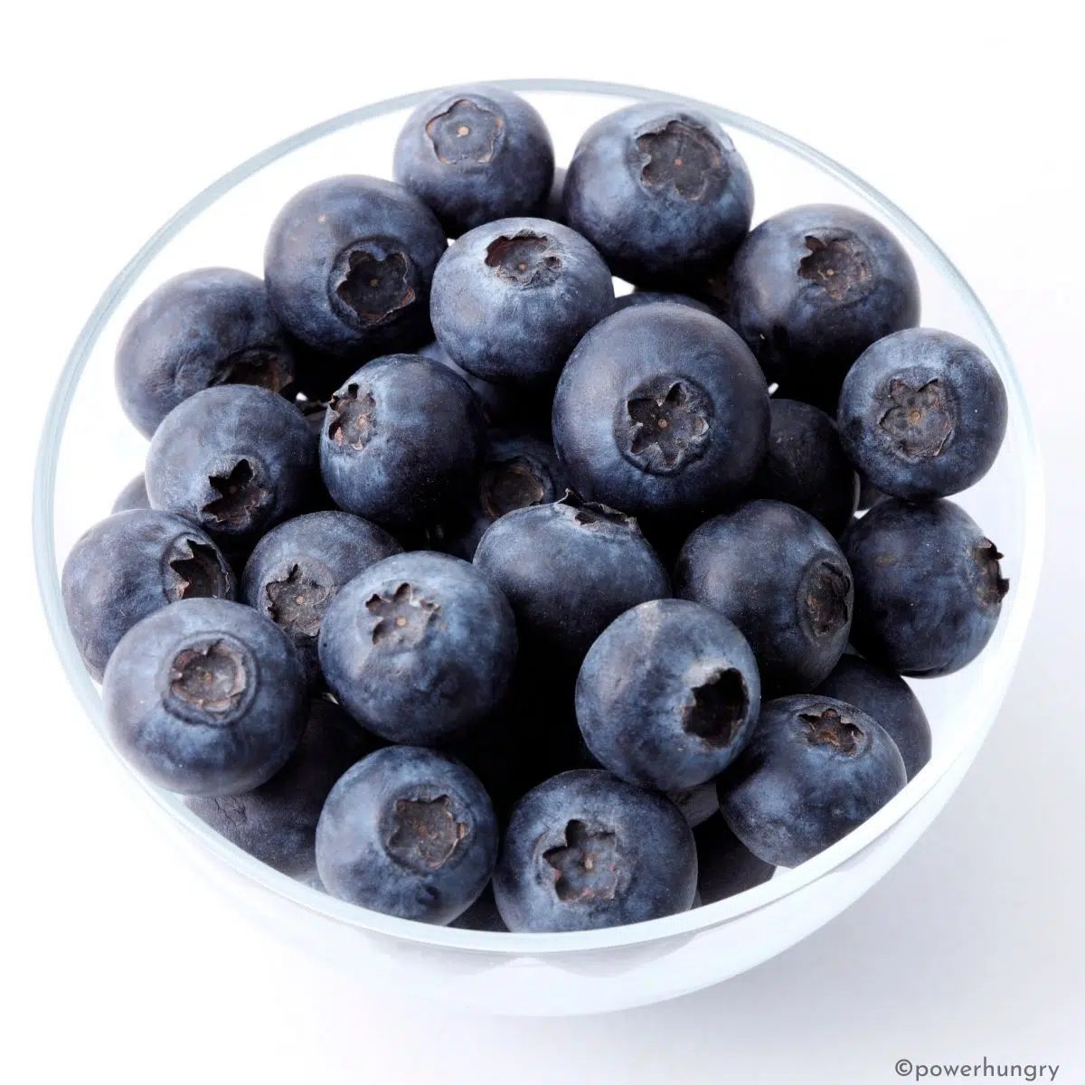fresh blueberries in a small glass dish