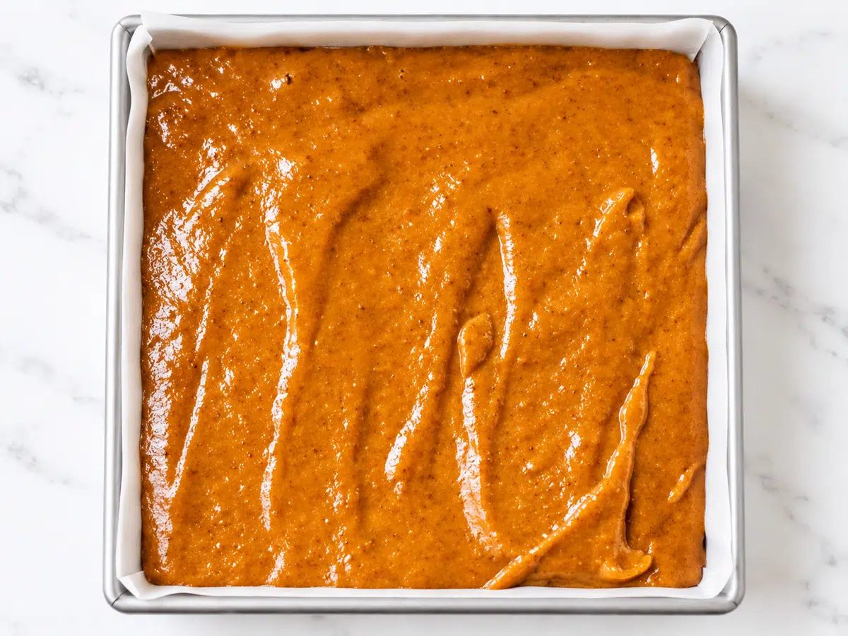 pumpkin protein bars batter spread in pan