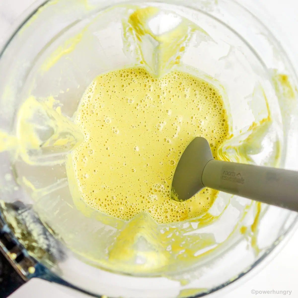 blended vegan pumpkin seed scramble blender in a blender container