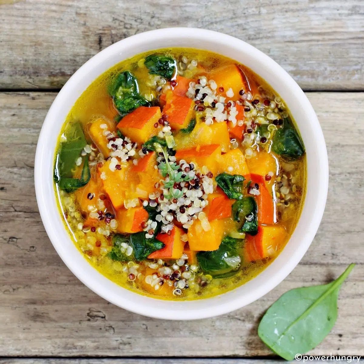 vegan quinoa minestrone in a white bowl