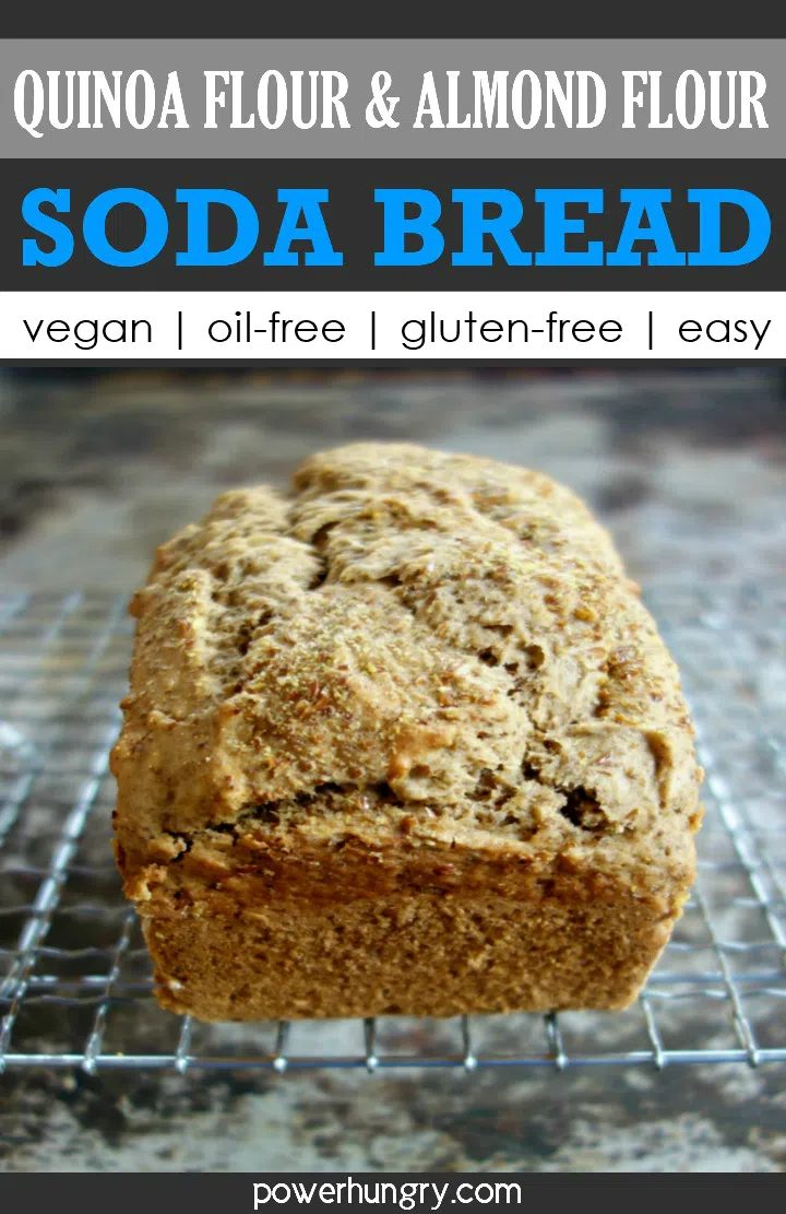 loaf of quinoa and almond soda bread on a wire cooling rack