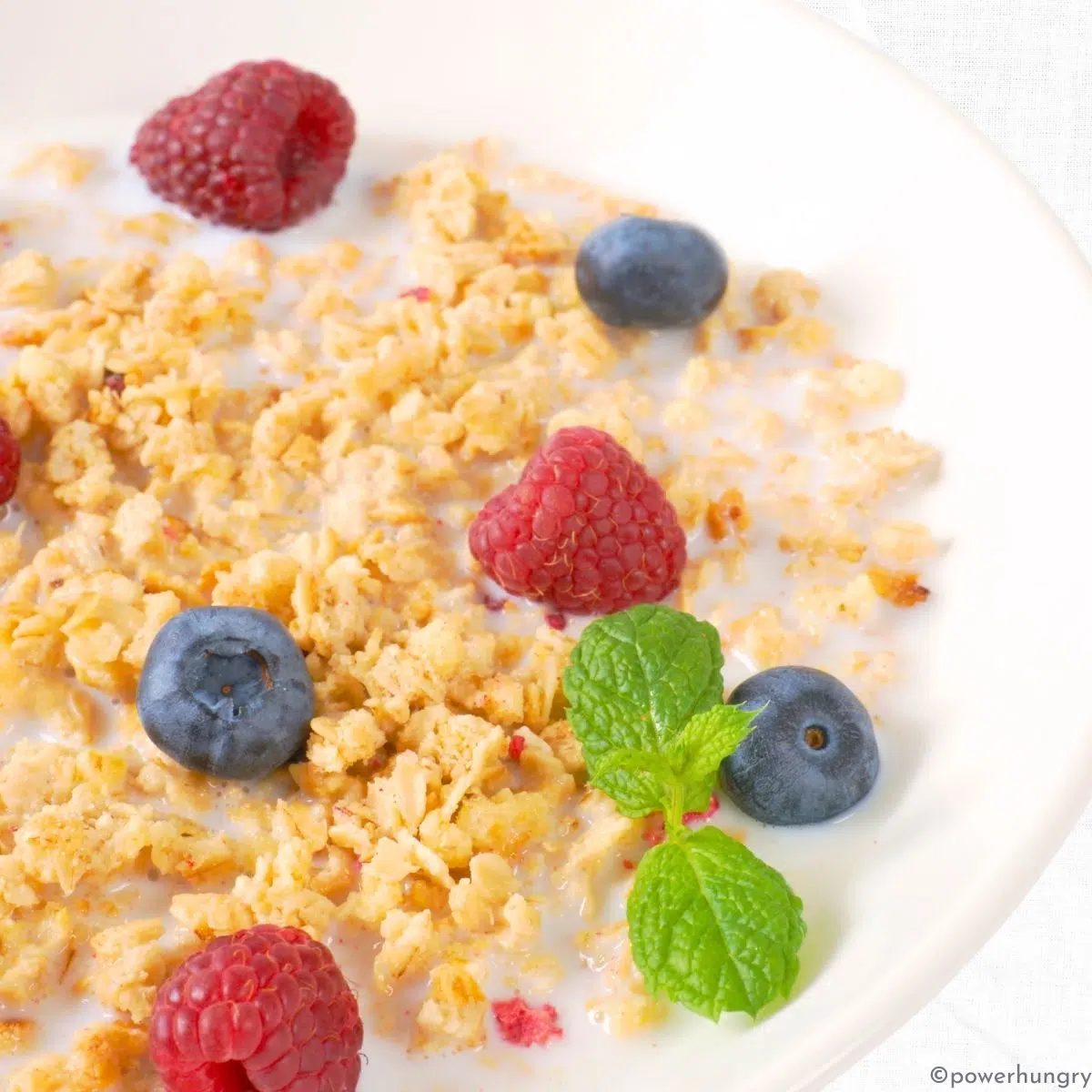 Quinoa flake granola in white bowl