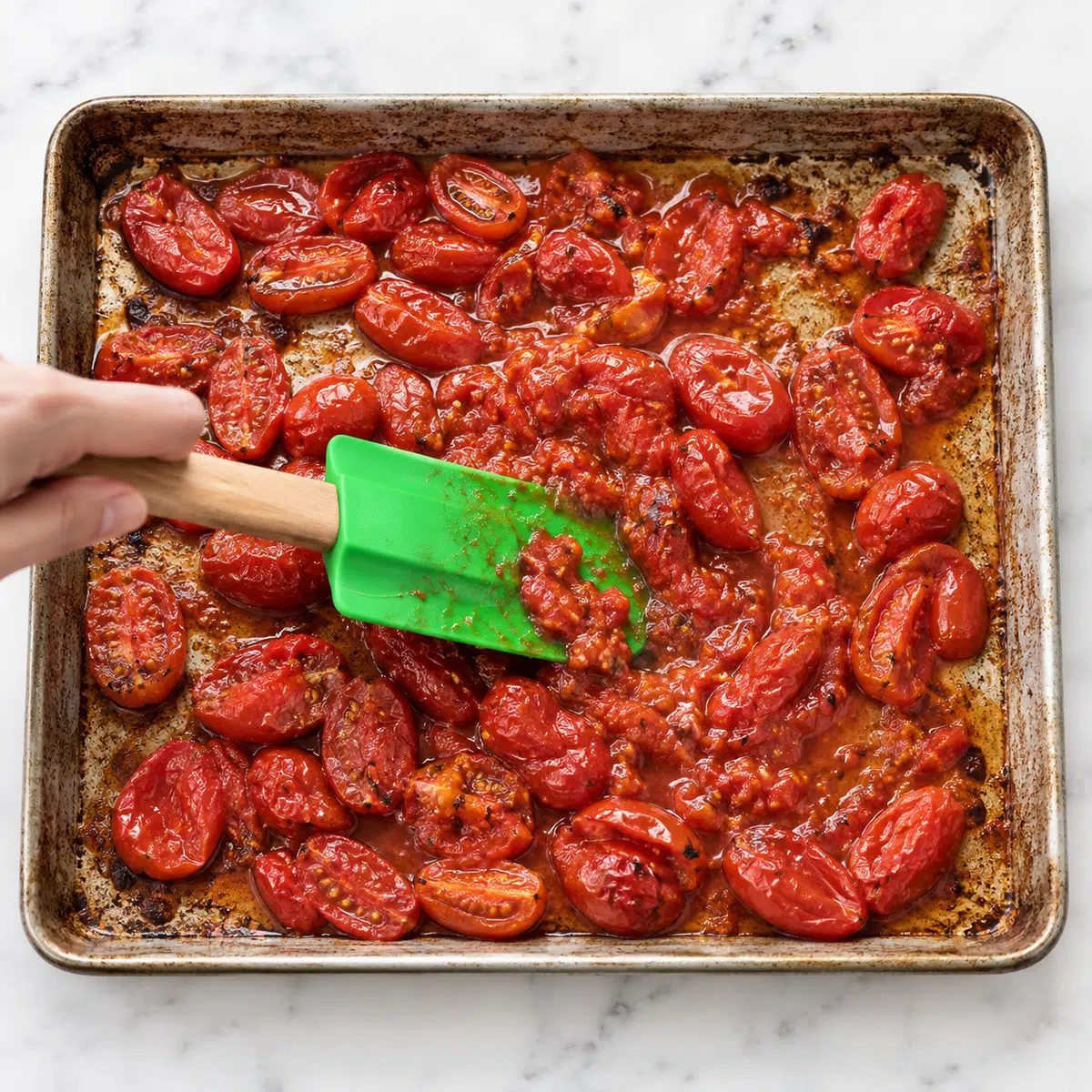mashing roasted canned tomatoes