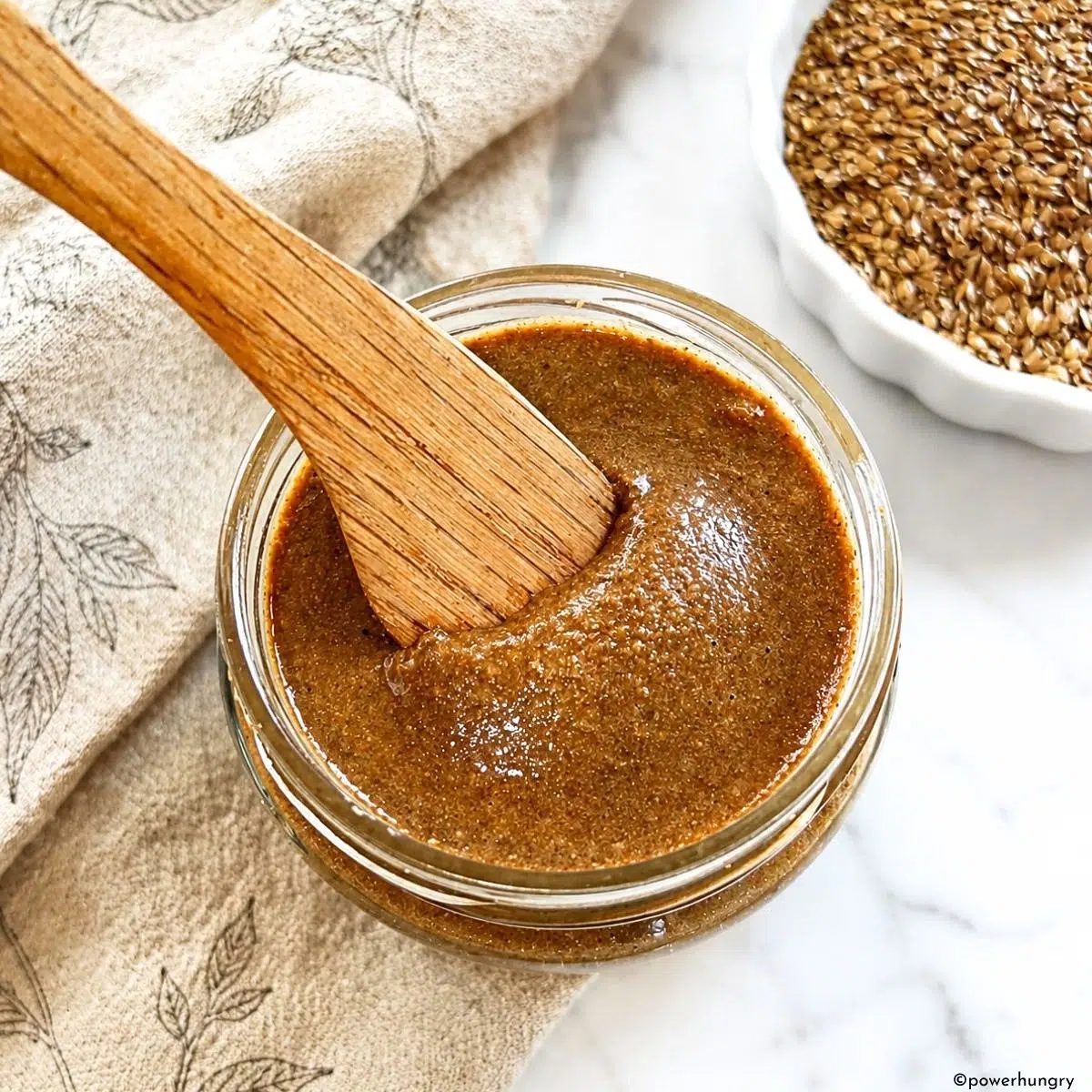 overhead shot of a jar of flaxseed butter