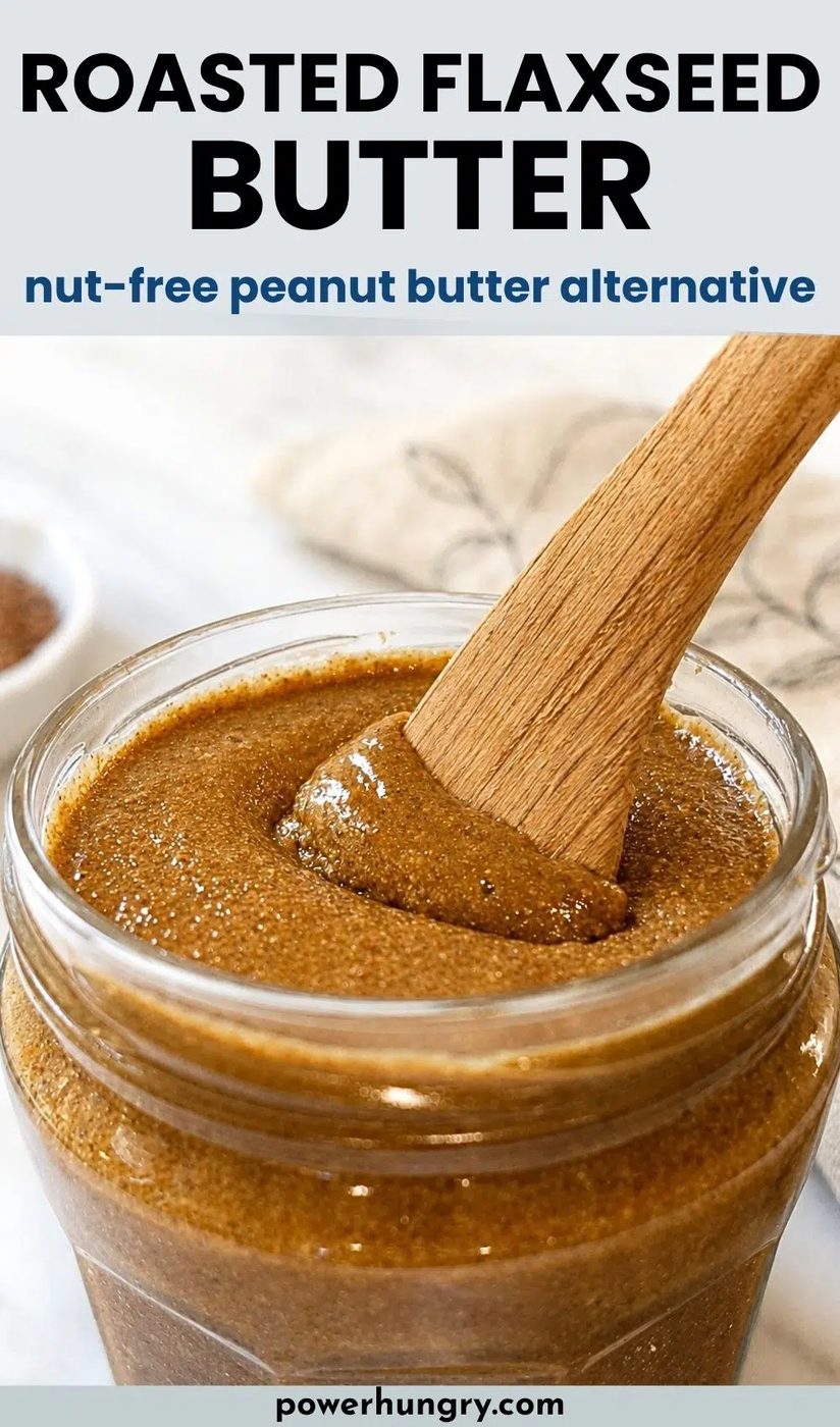 a jar of roasted flaxseed butter in a clear glass jar