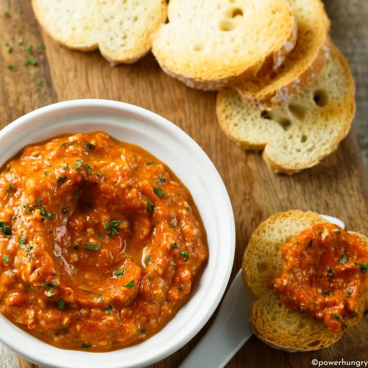 roasted pepper spread with some sliced bread