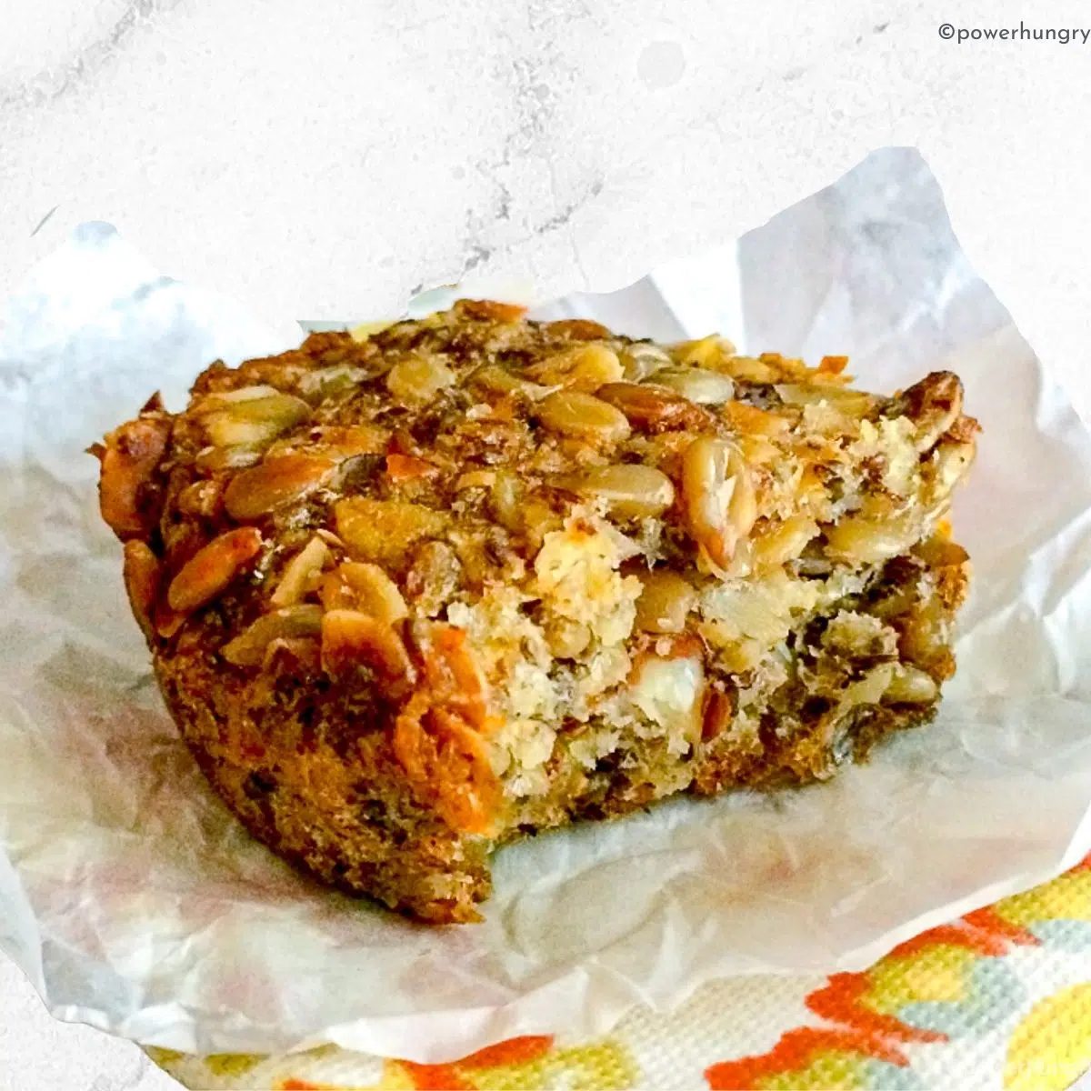 seeded oat protein bread with bite taken out