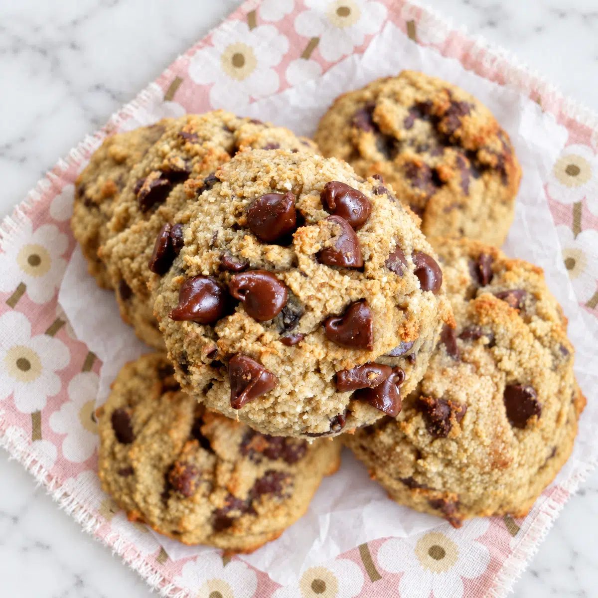 overhead image of a pile of coconut flour chocolate chip cookies