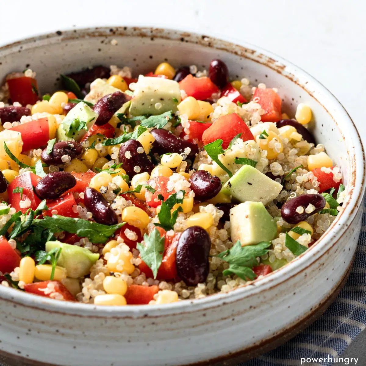 photo of southwestern quinoa salad in a white bowl