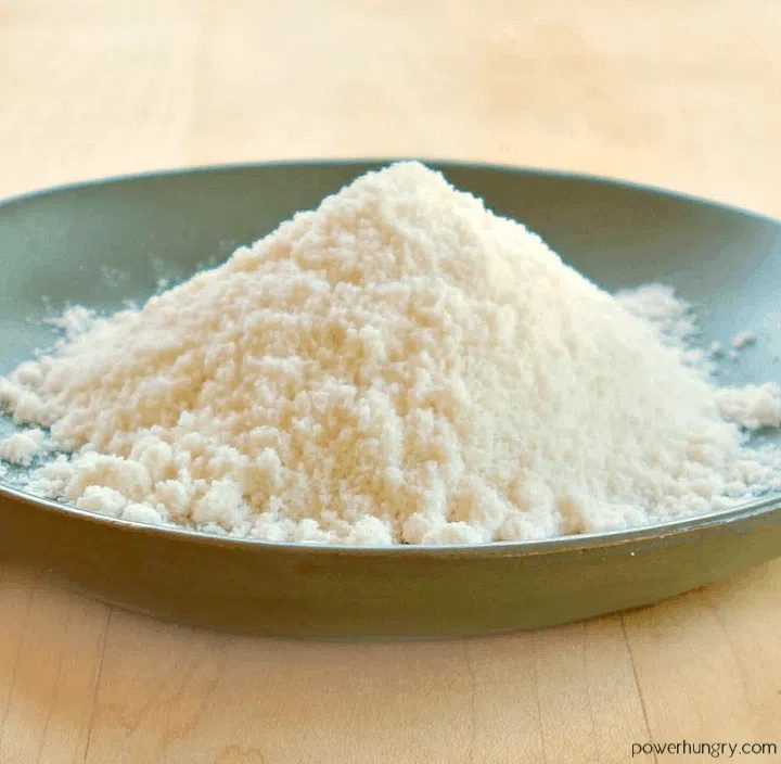 coconut flour in a sage green dish