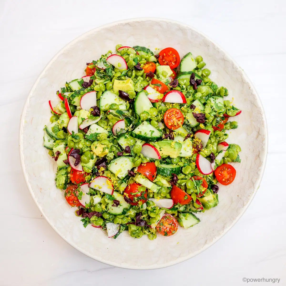 split pea salad in a white bowl